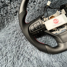 Load image into Gallery viewer, TTD Craft Lexus 2016-2022 RX350 450h / ES350 ES300/ GS350 GS450 / LX570 / GX460 / GS300 GS200T Carbon Fiber Steering Wheel