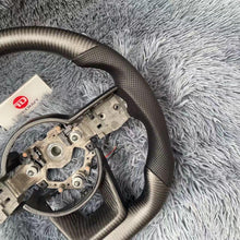 Load image into Gallery viewer, TTD Craft Nissan 2022-2025 Pathfinder Carbon Fiber Steering Wheel