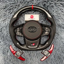 Cargar imagen en el visor de la galería, Volante de fibra de carbono TTD Craft para Toyota Supra MK5 A90 A91 (2020-2025)