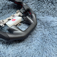 Cargar imagen en el visor de la galería, TTD Craft Nissan 2015-2024 Volante de fibra de carbono Titan