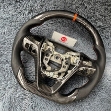 Load image into Gallery viewer, TTD Craft Ford 2013-2019 Ford Taurus / 2011-2014 Edge / 2011-2015 Explorer / 2011-2020 Flex Carbon Fiber Steering Wheel