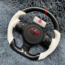 Lade das Bild in den Galerie-Viewer, TTD Craft Toyota 2006-2017 FJ Cruiser Carbonfaserlenkrad