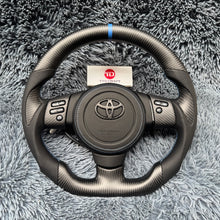 Lade das Bild in den Galerie-Viewer, TTD Craft Toyota 2006-2017 FJ Cruiser Carbonfaserlenkrad