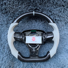 Load image into Gallery viewer, Real Carbon Fiber Sport Steering Wheel Fits Toyota Corolla Hatchback / RAV4 2019-2026 | TTD Craft
