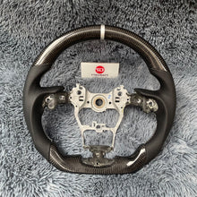 Lade das Bild in den Galerie-Viewer, 2021-2026 Toyota Sienna Carbon Fiber Steering Wheel Upgrade | TTD Craft