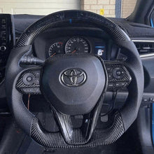 Cargar imagen en el visor de la galería, Volante de fibra de carbono TTD Craft para Toyota Corolla Hatchback RAV4 2019-2025