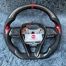 Cargar imagen en el visor de la galería, Volante de fibra de carbono TTD Craft para Toyota Corolla Hatchback RAV4 2019-2025
