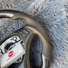 Load image into Gallery viewer, TTD Craft 1 SERIES E82 E88 / 3 SERIES E90 E91 E92 E93 / X1 E84 Carbon Fiber Steering Wheel