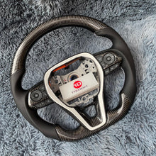 Cargar imagen en el visor de la galería, Volante de fibra de carbono TTD Craft para Toyota Corolla Hatchback RAV4 2019-2025