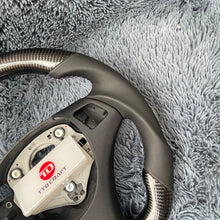 Lade das Bild in den Galerie-Viewer, TTD Craft 1 SERIES E82 E88 / 3 SERIES E90 E91 E92 E93 / X1 E84 Carbon Fiber Steering Wheel