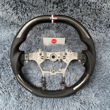 Load image into Gallery viewer, TTD Craft Toyota 2014 -2025 Hilux Revo Carbon Fiber Steering wheel