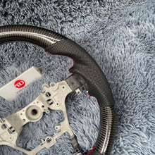 Load image into Gallery viewer, TTD Craft Toyota 2014 -2025 Hilux Revo Carbon Fiber Steering wheel