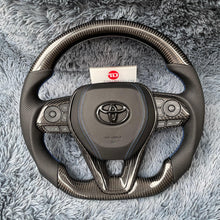 Cargar imagen en el visor de la galería, Volante de fibra de carbono TTD Craft para Toyota Corolla Hatchback RAV4 2019-2025