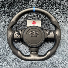 Lade das Bild in den Galerie-Viewer, TTD Craft Toyota 2006-2017 FJ Cruiser Carbonfaserlenkrad
