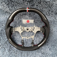 Lade das Bild in den Galerie-Viewer, Toyota Hilux Revo 2014-2026 Carbon Fiber Steering Wheel Upgrade | TTD Craft
