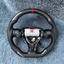 Загрузить изображение в средство просмотра галереи, Real Carbon Fiber Sport Steering Wheel Fits Toyota Corolla Hatchback / RAV4 2019-2026 | TTD Craft
